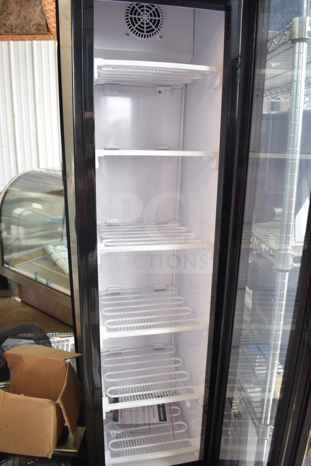 Brand new KoolMore Commercial Single Door Reach-In Merchandiser, 110-120V, 1 Phase, with shelving, minor scratches visible.