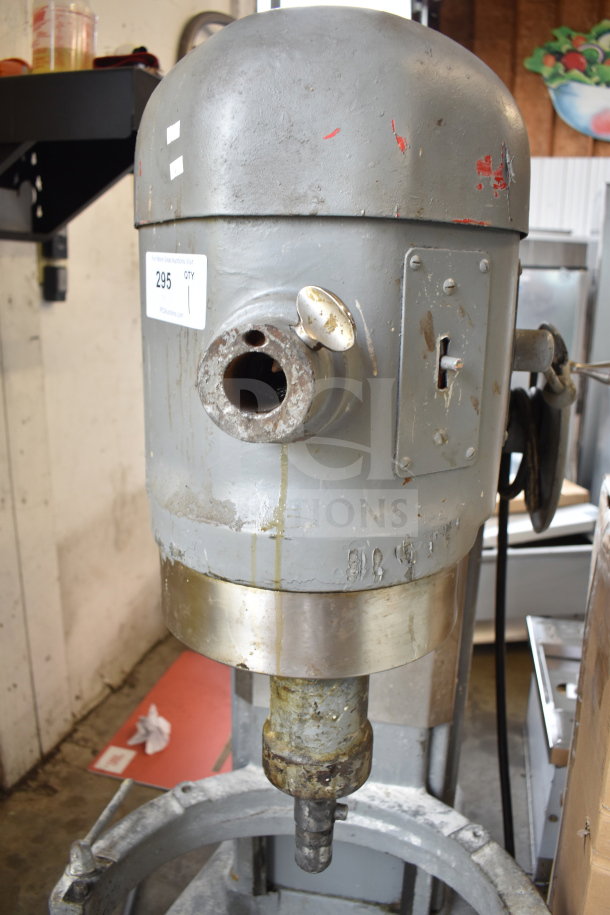 Hobart H-600 commercial 60-quart dough mixer, industrial gray finish, visible wear. Model tag: 230 volts, 1 phase.