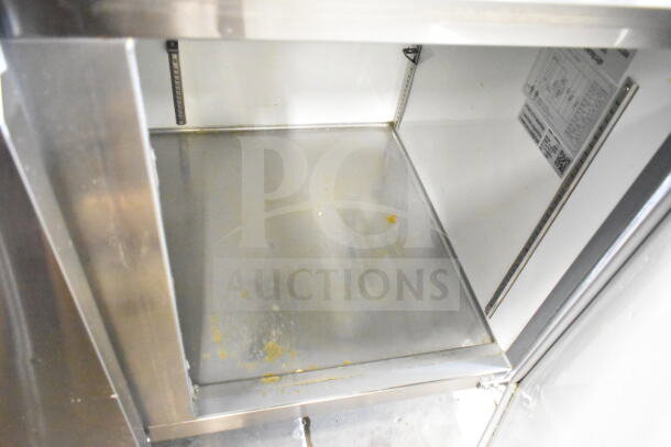 2023 Motak MPR-83-X Pizza Prep Table on casters, visible stainless steel interior, 115V, with specifications label.
