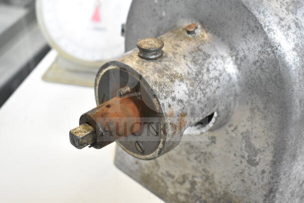 Commercial Pelican head, used condition, no blade included, showing signs of rust and wear.