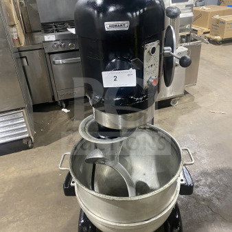 Hobart I800 commercial 80-quart mixer with stainless steel bowl, model 11-218590, 208V, 3-phase, visible dials and levers.