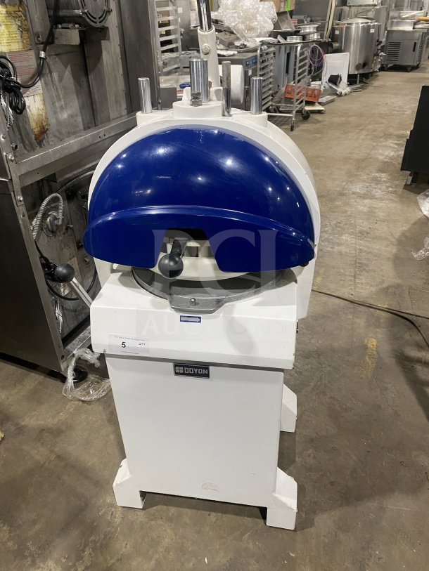Doyon commercial electric dough divider/rounder, white and blue, semi-automatic, used, visible Doyon branding.