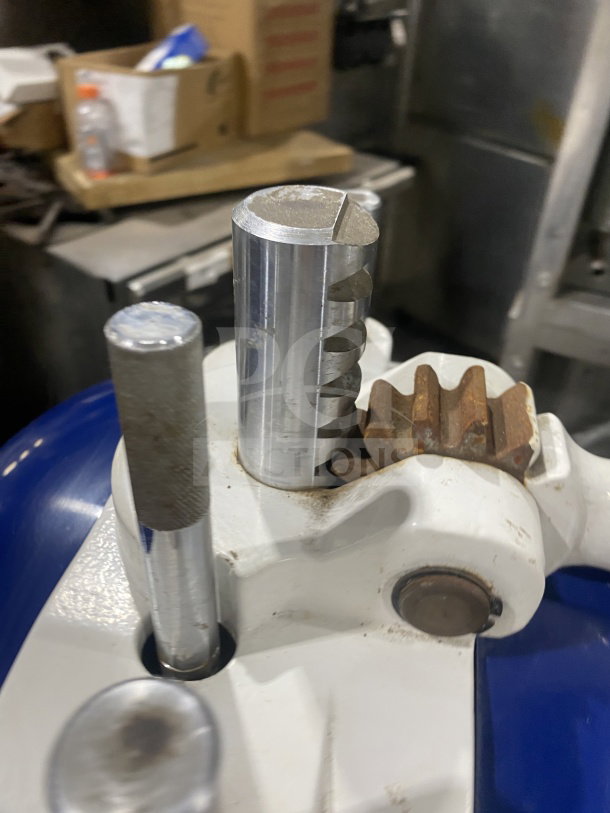 Doyon electric semi-automatic dough divider/rounder, white and blue, showing metal components and gear detail, used condition.