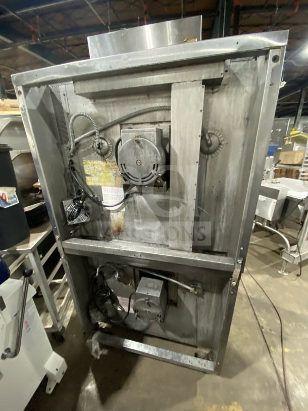 Blodgett stainless steel double stacked convection oven, gas powered, Energy Star certified, with wired rack, on casters.