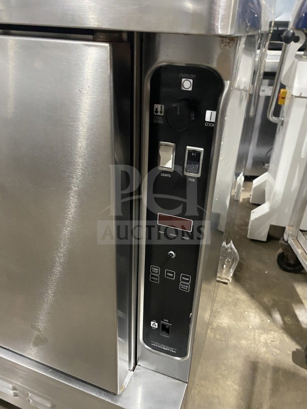 Blodgett commercial stainless steel double convection oven, gas powered, Energy Star certified, with wired rack, on casters.