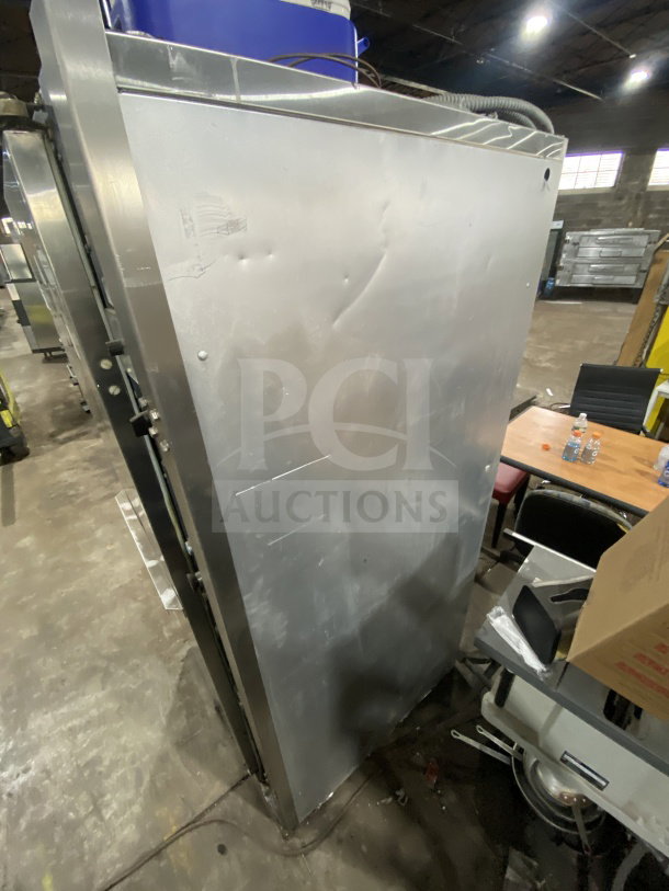 Revent stainless steel single door electric bakery proofer cabinet with integrated analog control panel, some surface wear visible.
