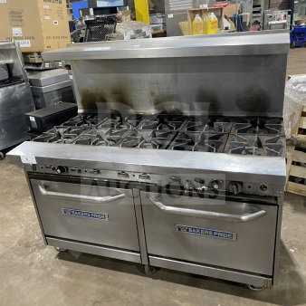 Bakers Pride stainless steel gas range with 10 burners, double oven, model 955394604036. Features backsplash, salamander shelf, oven racks, and casters.