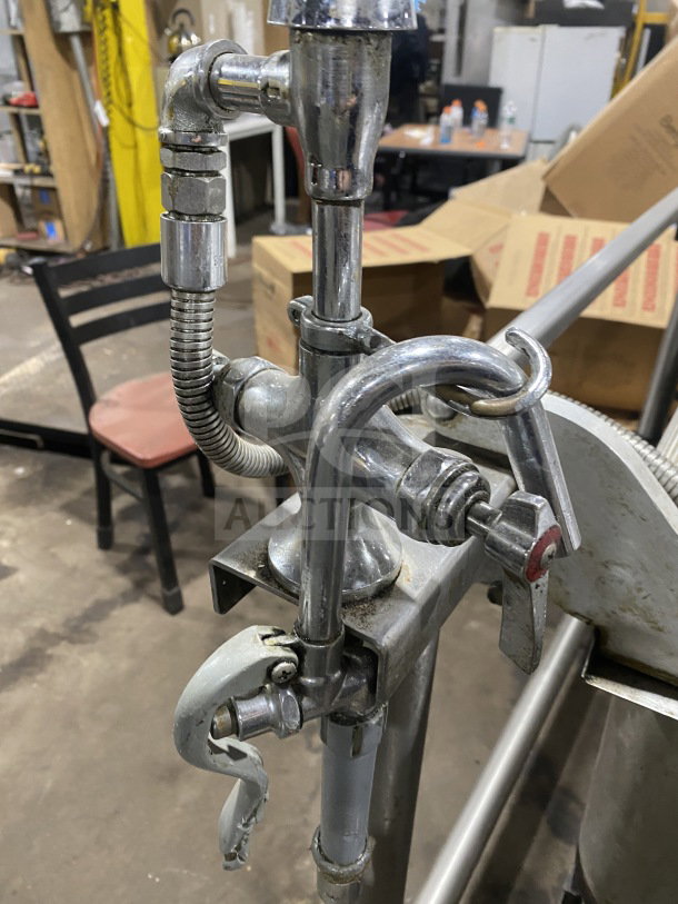Groen Eclipse Series 40-gallon tilted braising pan shown with stainless steel piping and control valve, model P-40G.