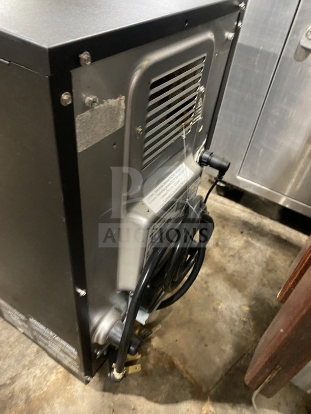 MerryChef Eikon E2S black countertop rapid cook oven with visible power cord and vent, serial number 2209213090728.