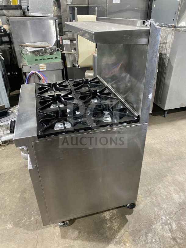CookRite commercial stainless steel 6-burner gas range/oven combo with backsplash, overhead salamander shelf, and casters.