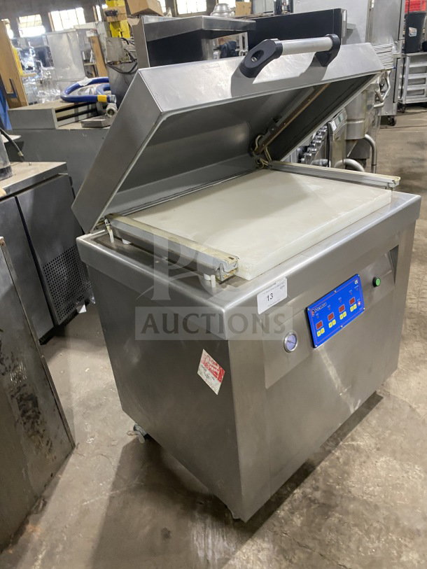 Promax Commercial Stainless Steel Vacuum Tray Sealer with digital controls, single chamber, on casters, used condition.