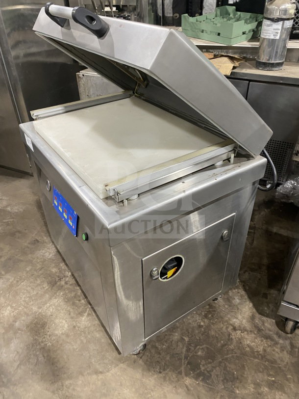 Promax stainless steel single chamber vacuum tray sealer with digital controls on casters, excellent condition.