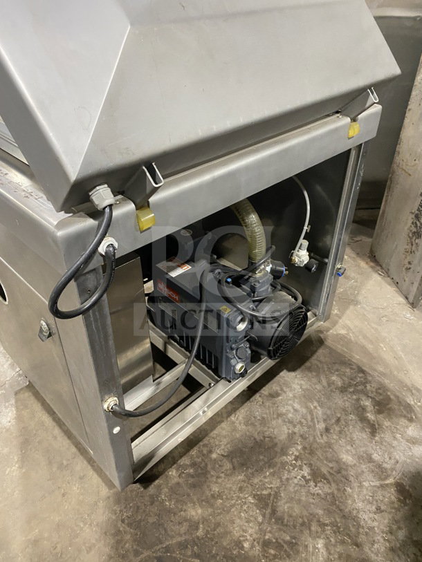 Promax commercial stainless steel vacuum tray sealer with digital controls, on casters. Appears in good condition.