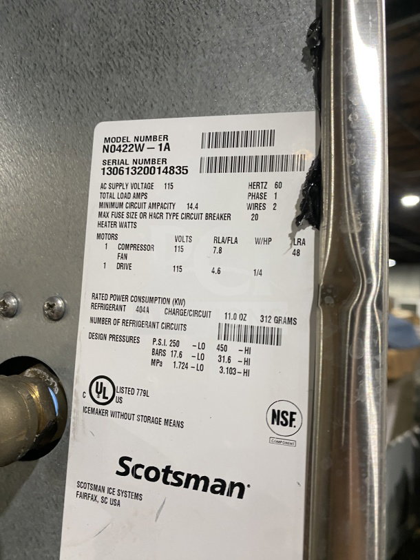 Scotsman Prodigy Series ice maker, model N0422W-1A, 115V, 1 phase, stainless steel, on legs; label with specs visible.