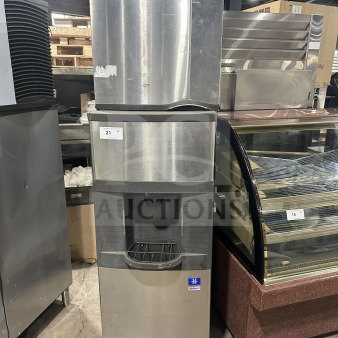Manitowoc SD0423W stainless steel ice machine and dispenser combo, electric, water-cooled, on legs, model SD0423W.