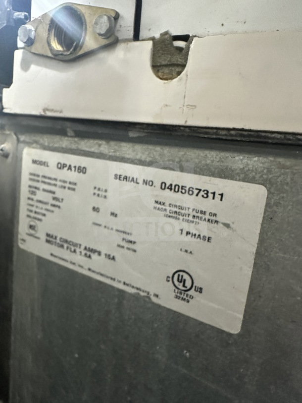 Manitowoc ice maker model SD0423W label showing serial number 040567311, 115V, 1 Phase, UL listed.