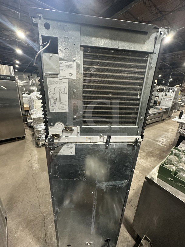 Manitowoc commercial ice machine, stainless steel, model SPA310, used condition, includes ice bin/dispenser, 115V, 1 phase.