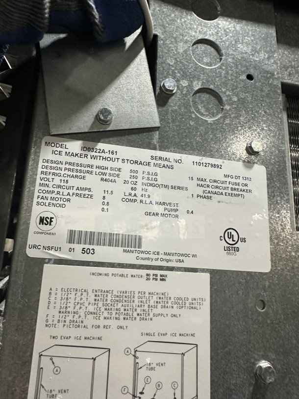 Manitowoc stainless steel ice making machine, Model ID0322A-161, 115V, 1-phase. Features serial number, UL and NSF listed.