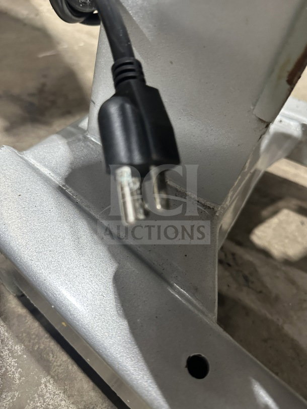 Preenex 30 Qt Commercial Mixer plug detail shows standard 110V plug on a metallic base, highlighting connectivity.