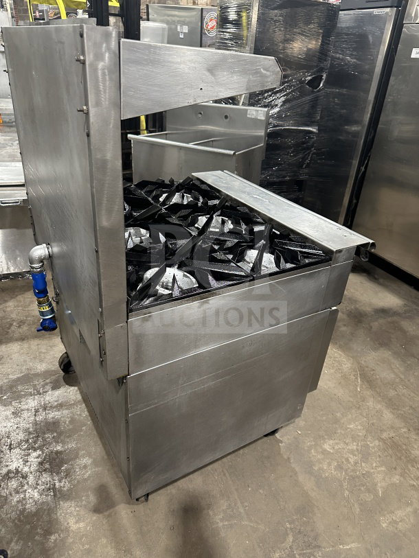 Vulcan commercial stainless steel gas 6-burner range/oven combo with backsplash, wired rack, and casters. Great condition.