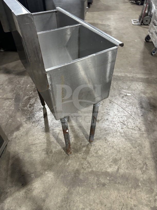 Stainless steel 2-compartment utility sink with legs, SN: 847962. Features durable build; suitable for commercial use.