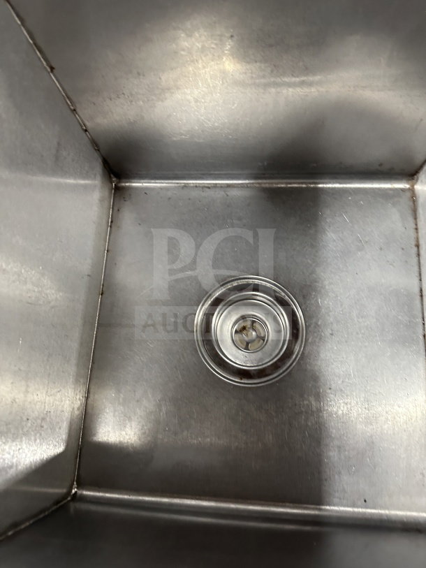Commercial stainless steel 2-compartment utility sink on legs, SN: 847962. Clean condition, ideal for scullery use.
