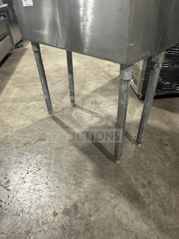 Commercial stainless steel 2-compartment scullery utility sink with legs, serial number 847962, in used condition.