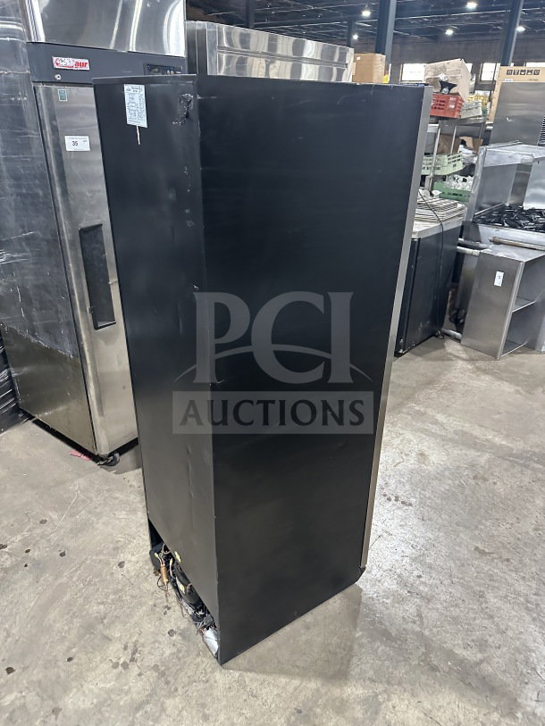 Eurodib single door wine cooler merchandiser, Model USF-168S, black finish, commercial use, 110/120V, visible wear on surface.