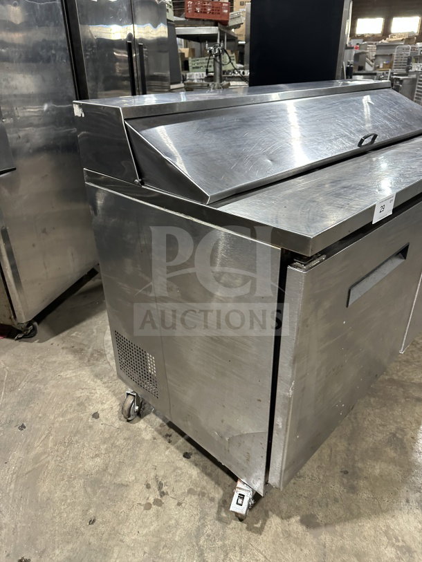Asber 2-door stainless steel refrigerated prep table, model PTS-60-16 60, on casters, in used condition.