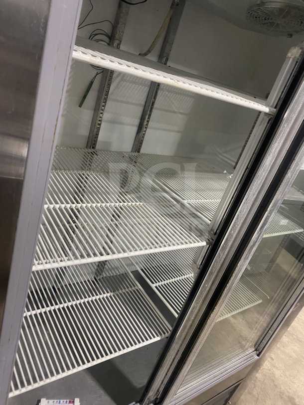 Leader LS54 commercial refrigerator, sliding glass doors, poly-coated wire racks, stainless steel, used condition.