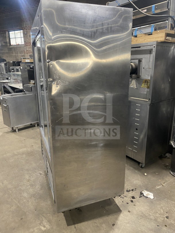 Leader LS54 stainless steel reach-in refrigerator merchandiser with sliding glass doors, poly-coated wire rack, 115V.