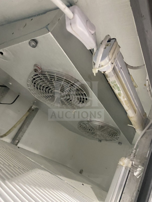 Leader LS54 commercial refrigerator interior showing fans and light fixture, with visible wiring. Good condition.