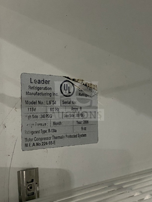 Leader LS54 Reach-In Refrigerator, sliding glass doors, poly coated rack, 115V, model info tag, 2006, R-134a refrigerant.
