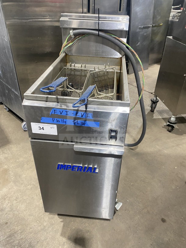 Imperial IFS50E commercial stainless steel electric deep fryer with basket and splash back, on casters, Model SN: 06128823.