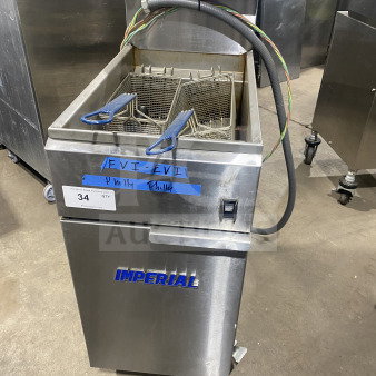 Imperial IFS50E commercial stainless steel electric deep fryer with basket and splash back, on casters, Model SN: 06128823.