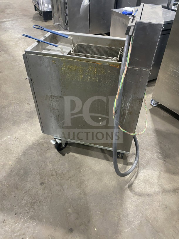 Imperial IFS-50-E stainless steel deep fryer, electric, with fry basket, splash back, casters, model IFS50E, SN 06128823.