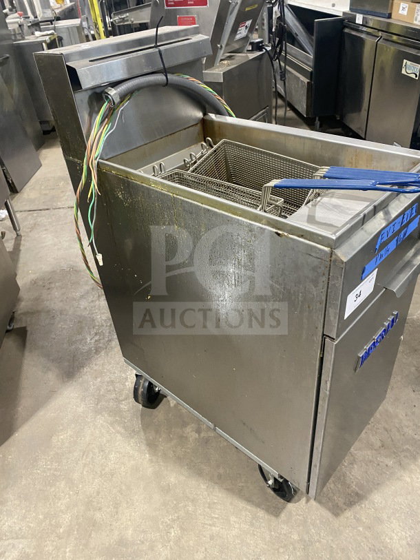 Imperial IFS50E stainless steel electric deep fryer with fry basket, splash back, and casters. Model: IFS-50-E, SN: 06128823.