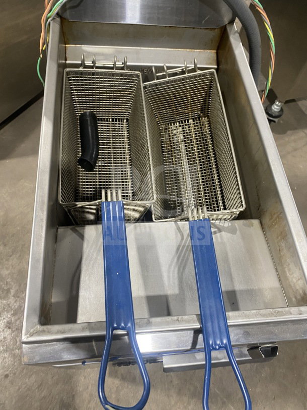 Imperial IFS50E stainless steel electric deep fryer with two fry baskets and splash back, on casters. Model: IFS-50-E.