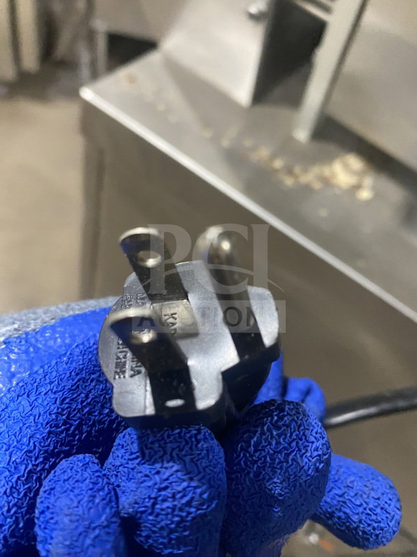Close-up of the power plug of a Superior Commercial Stainless Steel Electric Tortilla Machine, Model 1CH4.5X9TM.