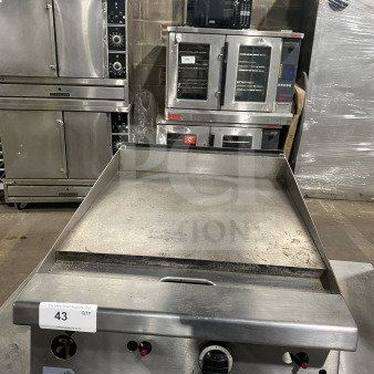 Garland G1GG24-G24 stainless steel gas griddle with back and side splash, countertop model, on legs, used condition.