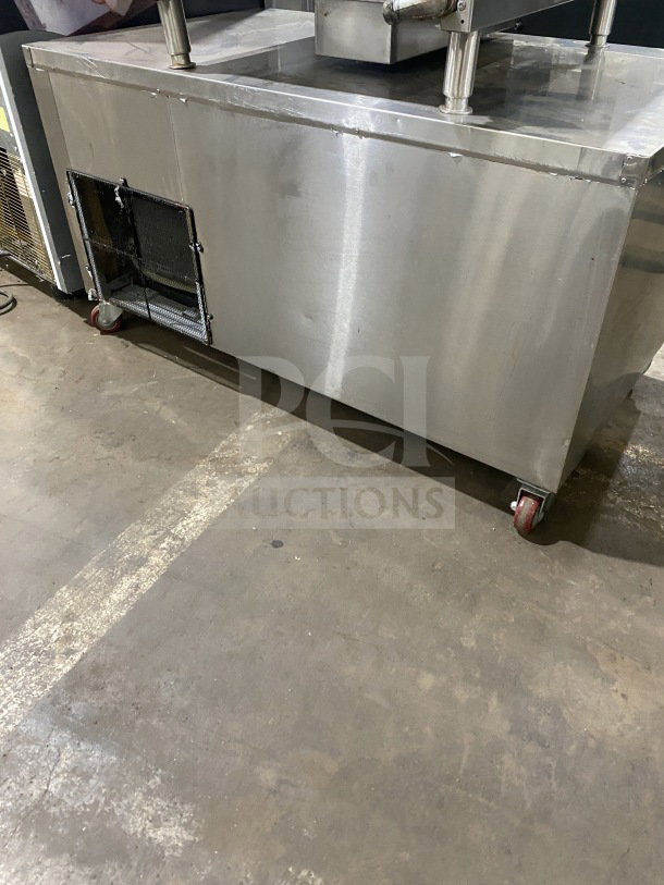 Cooltech Commercial Stainless Steel 2-Drawer Chef Base, Model CUST48CF, with digital display and casters, heavy-duty condition.