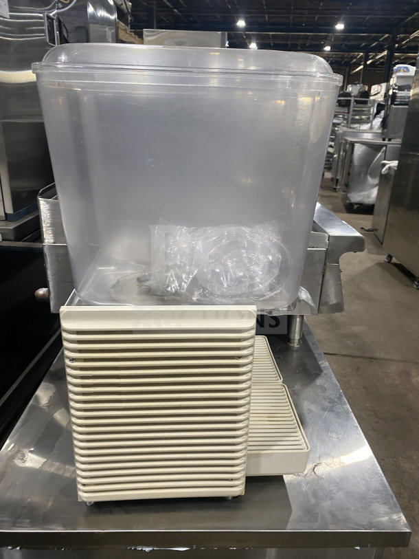 Crathco D25-4 commercial beverage dispenser, stainless steel, twin clear hoppers, double drip trays, 115V, model D25-4.