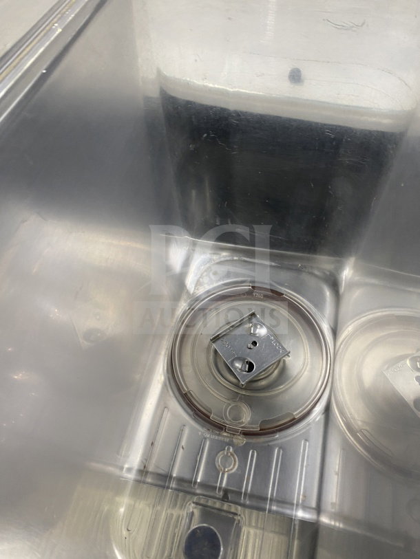 Crathco D254 stainless steel beverage dispenser with clear hoppers and double drip trays. Model D25-4, SN: T331133, 115V.