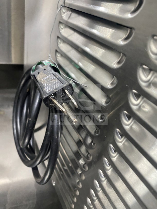 Crathco Model D254 stainless steel commercial beverage dispenser, featuring a coiled power cord.
