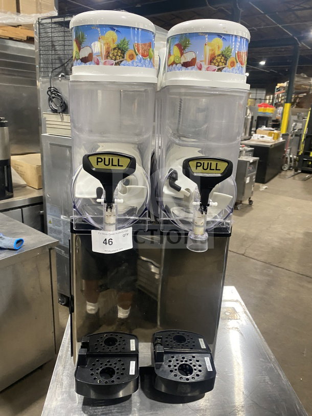 Icetro SSM280 stainless steel electric countertop twin slushy machine with clear polycarbonate hoppers and drip tray, 115V.
