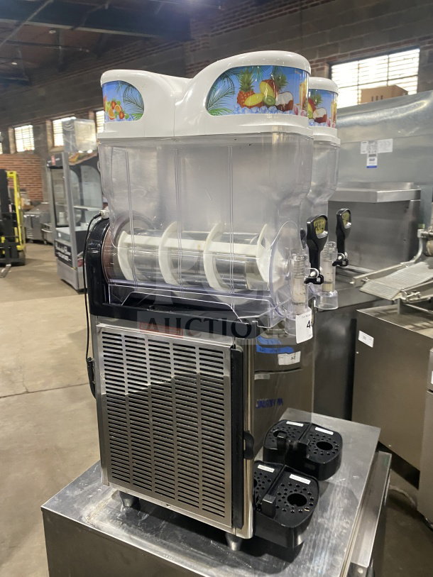 Icetro SSM280 commercial countertop slushy machine with stainless steel body, clear polycarbonate hoppers, and drip tray. 115V.