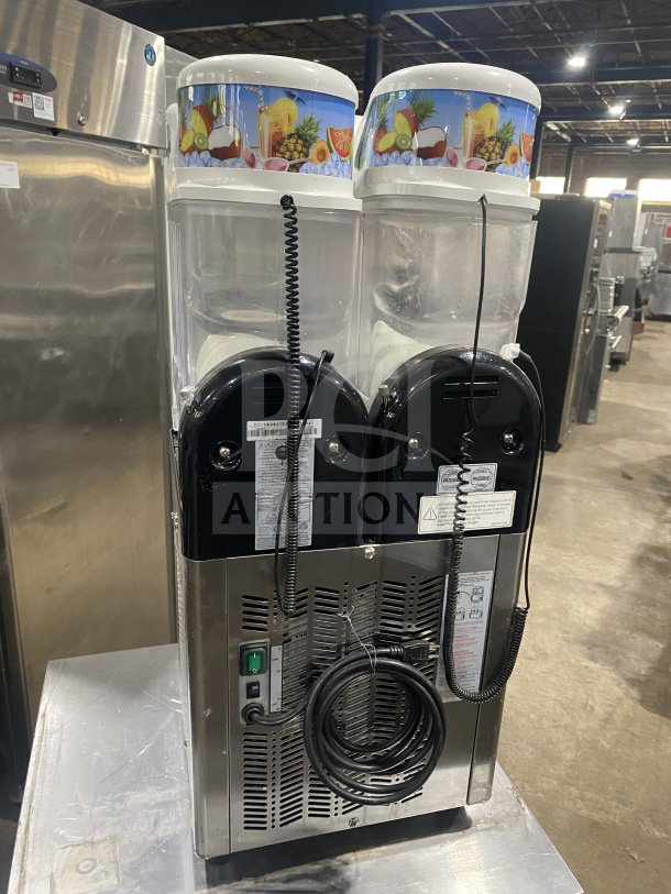 Icetro SSM280 commercial slushy machine, stainless steel, twin clear hoppers, 115V, includes drip tray, good condition.