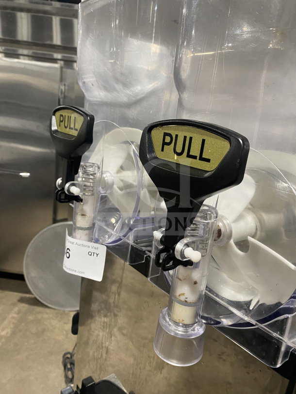 Icetro SSM280 commercial frozen beverage machine with twin clear polycarbonate hoppers, drip tray, and pull lever, 115V.
