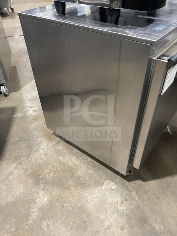 Beverage-Air UCR27Y stainless steel undercounter refrigerator, shallow-depth, poly-coated wire rack, on casters, SN: 7903528.