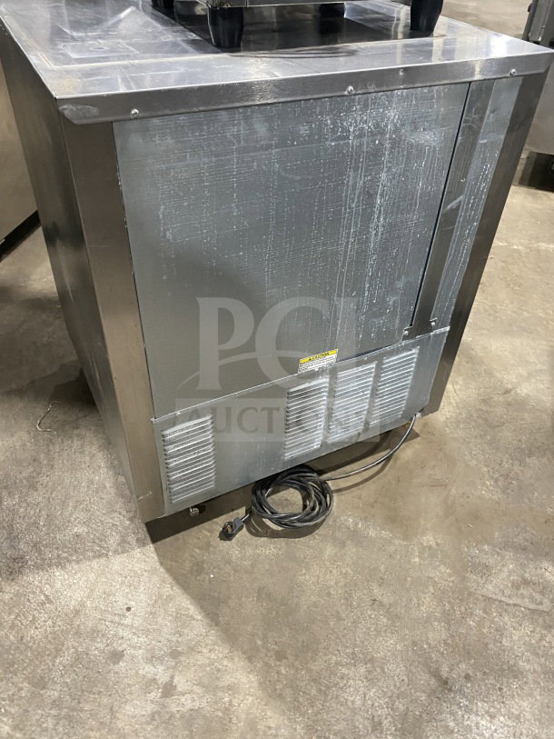 Beverage-Air UCR27Y stainless steel undercounter refrigerator, with poly-coated rack, on casters, 115V, single door.